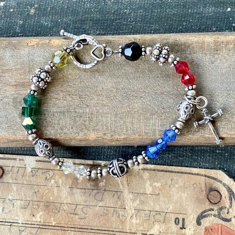 Beaded Bracelet with Sterling Silver Beads and Holy Cross